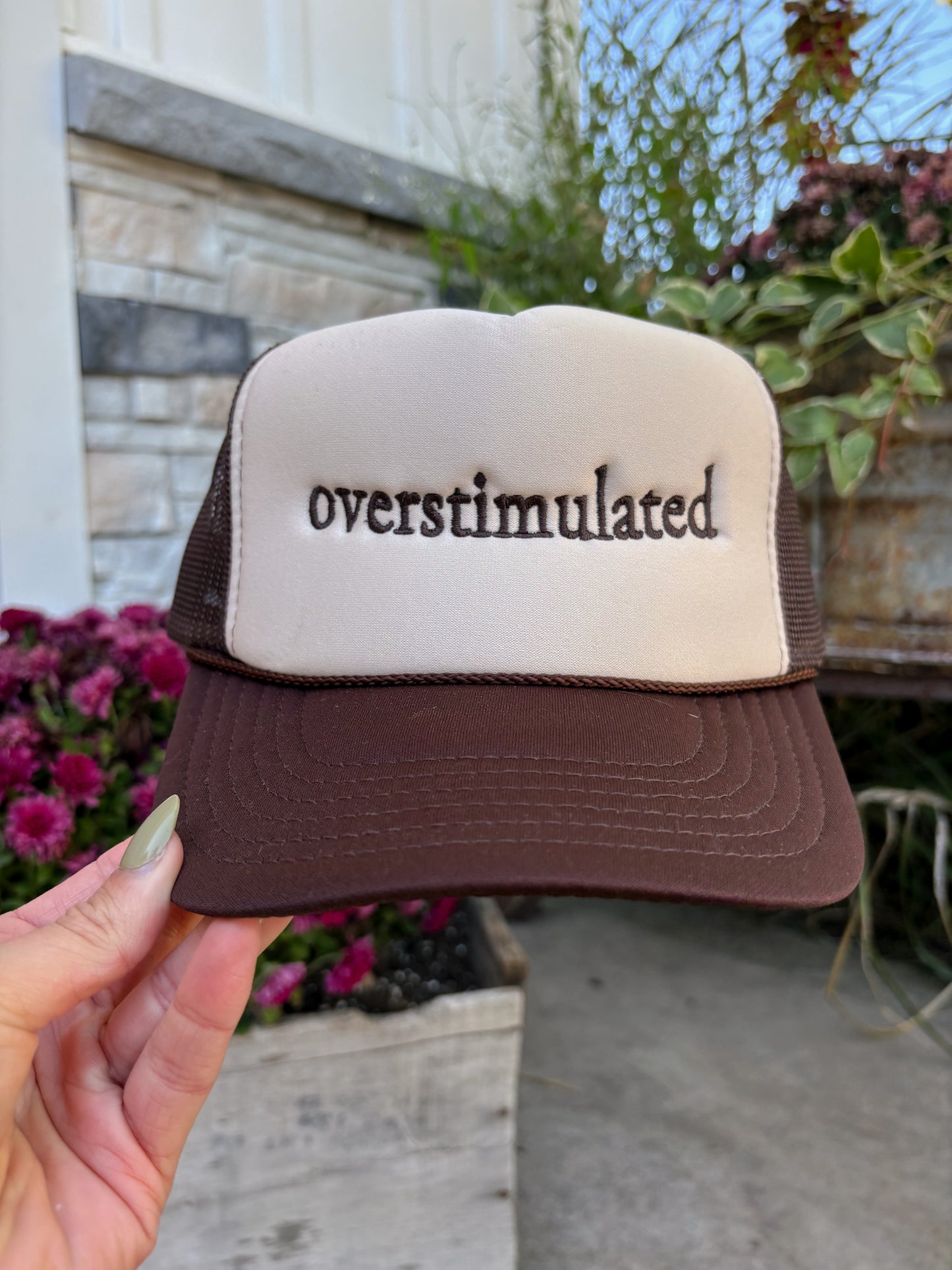 “OVERSTIMULATED” EMBROIDERED TRUCKER HAT